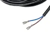 A close-up of a black power cord with two exposed wires, one blue and one brown, each with a metal connector. Produktbild-Vorschau