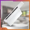 A white air purifier is displayed on a white pedestal against a blurred background of a living room. Podgląd zdjęcia produktu