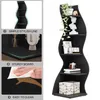 A black, wavy corner shelf unit is displayed, featuring decorative items and text boxes highlighting product features. Podgląd zdjęcia produktu