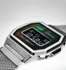 Close-up of a Casio digital watch with a metallic band and a green iridescent dial. Voir les images du produit