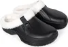 A pair of black clogs with white fluffy lining. Produktbild-Vorschau