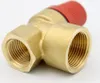 A close-up studio shot of a brass safety valve with a red cap. Anteprima dell’immagine prodotto