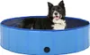 A dog is lying in a blue foldable pool. Náhľad obrázku produktu