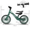 A green balance bike with dimensions indicated by measurement lines and text. Voir les images du produit