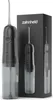 A black and gray electric oral irrigator and its packaging are displayed against a white background. Produktbild-Vorschau