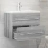 A modern bathroom vanity with a sink and two drawers against a tiled wall. Anteprima dell’immagine prodotto