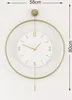 A wall clock with a gold frame and a white face, showing dimensions. Náhľad obrázku produktu