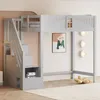 A grey loft bed with stairs and storage is shown in a room. Náhled obrázku produktu
