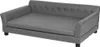 A gray pet sofa with a tufted backrest and studded trim. Voir les images du produit