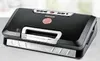 A vacuum sealer machine on a table. Náhled obrázku produktu