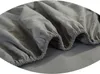 A close-up view of a gray fitted sheet, showing the elasticized edge. Produktbild-Vorschau