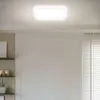 A rectangular LED panel light is mounted on a white ceiling. Náhľad obrázku produktu