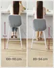 Two images of a person sitting on a bar stool, with measurements shown. Náhled obrázku produktu