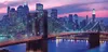 A nighttime view of the Brooklyn Bridge with the New York City skyline in the background. Podgląd zdjęcia produktu
