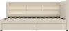 A beige upholstered daybed with storage drawers and a bookshelf headboard, shown from the side with the mattress slats visible. Produktbild-Vorschau