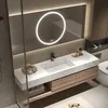 A modern bathroom vanity with a sink, faucet, and LED mirror. Anteprima dell’immagine prodotto