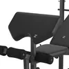 A close-up view of a black exercise bench, focusing on the padded armrest and seat. Produktbild-Vorschau