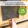 A hand is shown adjusting a clear plexiglass panel on a wooden animal enclosure. Produktbild-Vorschau