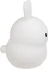 A side view of a white, cartoonish rabbit-shaped night light. Náhľad obrázku produktu