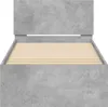 A bed frame with a concrete-like finish and wooden slats. Voir les images du produit
