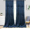 A room with blue velvet curtains hanging over a window, a white dresser, and a yellow chair with a blanket. Produktbild-Vorschau