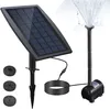 A solar-powered fountain pump kit with a solar panel and multiple nozzle attachments. Produktbild-Vorschau