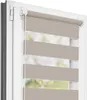 A close-up view of a taupe and white striped roller blind installed in a window frame. Produktbild-Vorschau