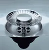 A close-up view of a stainless steel sink drain with a strainer basket. Produktbild-Vorschau