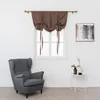 A room with a window, a chair, and a small table. Náhled obrázku produktu