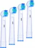 Four white electric toothbrush heads with blue and green bristles are arranged diagonally against a white background. Produktbild-Vorschau