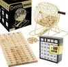 A collection of bingo game components including a bingo cage, balls, bingo cards, and a wooden bingo board. Produktbild-Vorschau
