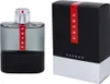 A bottle of Prada Luna Rossa Carbon Eau de Toilette and its packaging are displayed side-by-side on a white background. Podgląd zdjęcia produktu