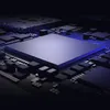 A close-up, angled view of a computer chip on a circuit board, with blue lighting. Náhľad obrázku produktu