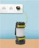 A lantern is plugged into a wall socket for charging. Náhled obrázku produktu