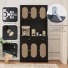 A black cabinet with cane-woven doors and drawers, featuring close-up insets of its hardware and anti-tipping devices. Podgląd zdjęcia produktu