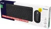 The image shows the retail packaging of a Trust Lyra Bluetooth keyboard and mouse set. The packaging is predominantly white with dark blue and red accents, featuring an image of the keyboard and mouse. Anteprima dell’immagine prodotto