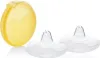 A yellow storage box and two clear nipple shields are displayed against a white background. Produktbild-Vorschau