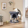 Two cats interacting with a cat tree in a home setting. Produktbild-Vorschau