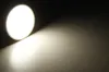 A bright LED spotlight illuminates a textured surface, casting a warm glow and a distinct shadow. Produktbild-Vorschau