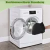 A person is holding a black cleaning mitt in front of an open washing machine. Náhľad obrázku produktu