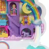A close-up view of a Polly Pocket unicorn-themed playset, featuring miniature dolls, a castle, a slide, and a rainbow backdrop. Produktbild-Vorschau