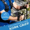 A person hiking, holding trekking poles with a close-up on the grips and straps. Produktbild-Vorschau