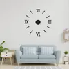 A living room with a light blue sofa and a wall clock with Roman numerals. Náhľad obrázku produktu