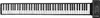 A top-down view of a black roll-up piano with white keys, laid out flat on a white background. The right end of the piano has a control panel with buttons and a small screen. Náhled obrázku produktu
