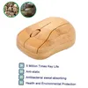A bamboo computer mouse with informational text and small circular images of bamboo. Produktbild-Vorschau