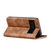 A brown flip case for a smartphone, shown from the side with the cover open. Produktbild-Vorschau