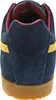 The back view of a blue Gola Harrier sneaker with a yellow stripe and a brown sole. Produktbild-Vorschau