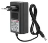 A black lithium battery charger with a European plug and a coiled cable. Produktbild-Vorschau
