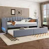 A modern bedroom with a gray upholstered daybed and a pull-out trundle bed. Náhled obrázku produktu