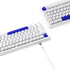 Two white mechanical keyboards with blue keycaps are shown against a white background. One keyboard is in the foreground and connected to a white cable. Produktbild-Vorschau